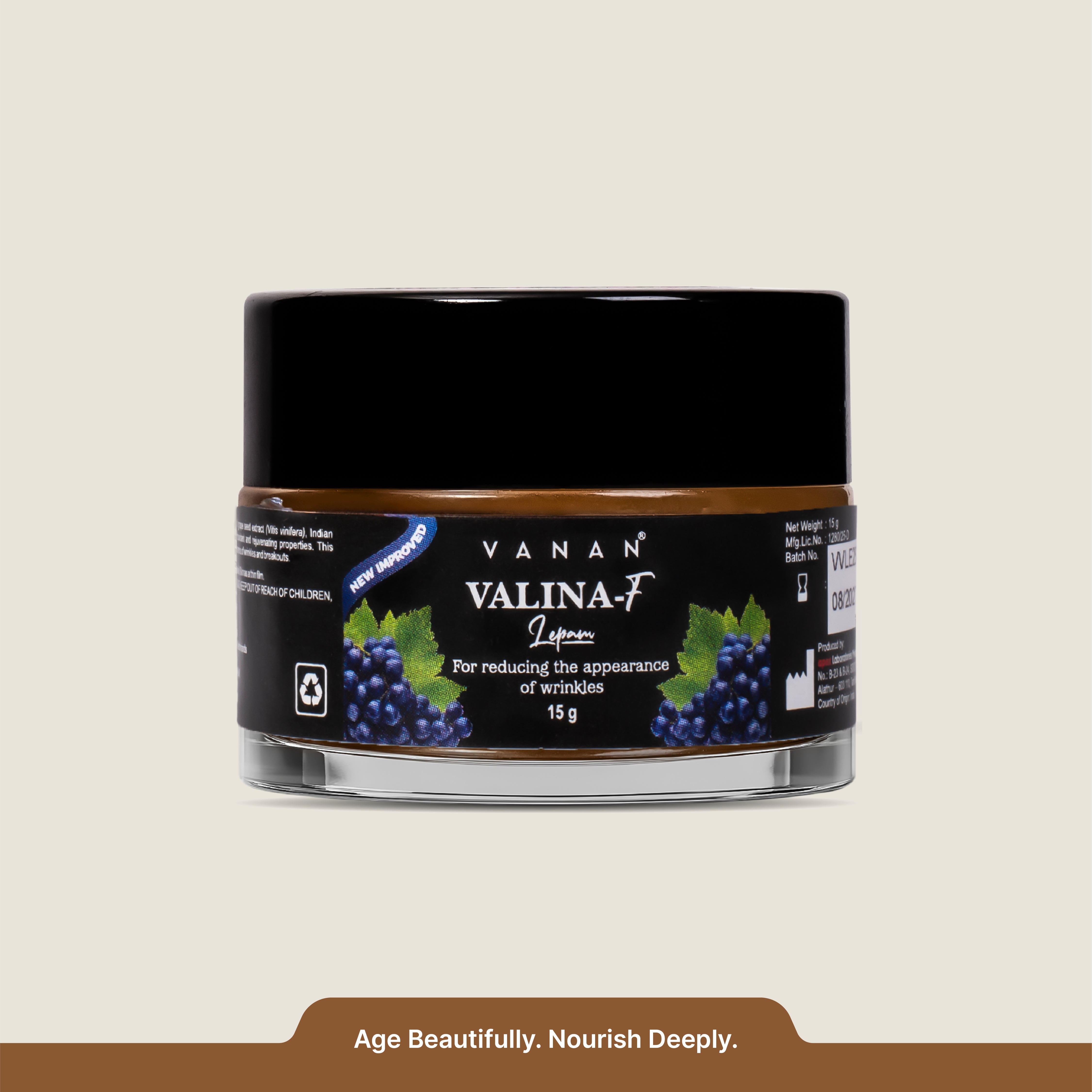 Jar of Vanan Valina-F cream with black lid and blue label on a beige background